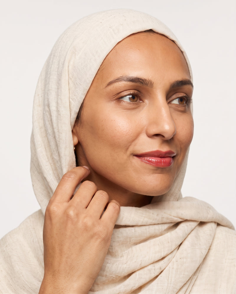 Amira wearing Bougainvillea tinted lip balm