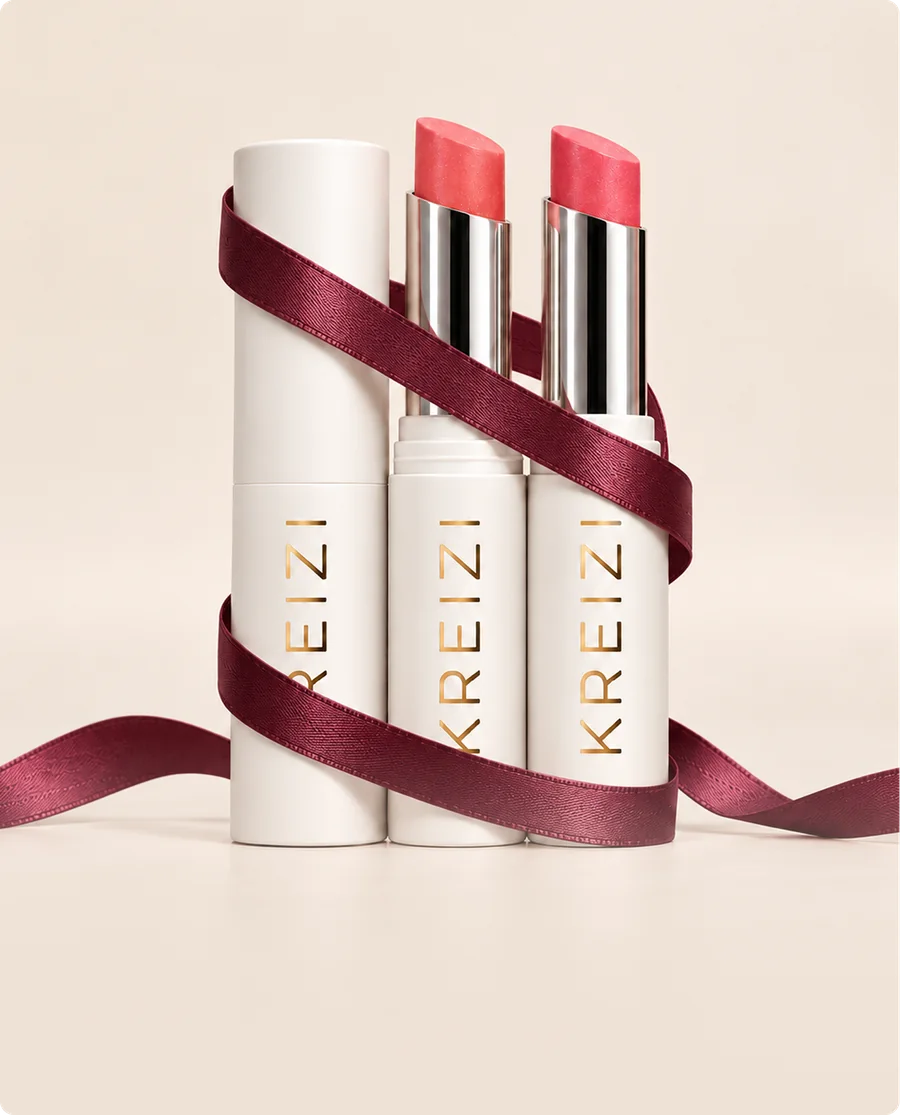 Kreizi lipsticks wrapped in a burgundy ribbon